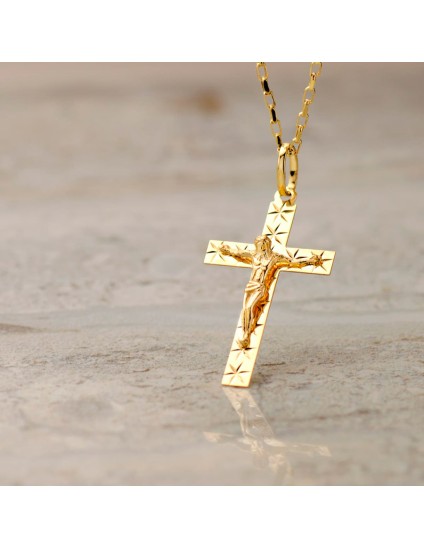 Cruz Oro 18K Tallada con Cristo 34x19 mm | Joyería Parejo