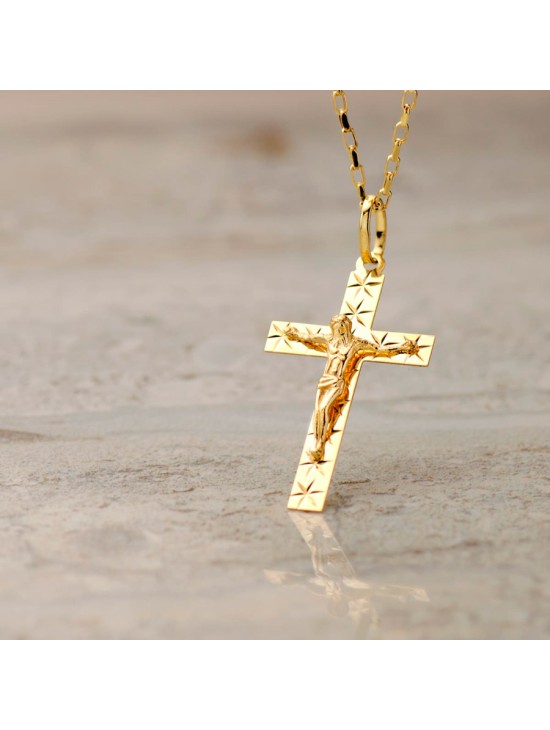 Cruz Oro 18K Tallada con Cristo 34x19 mm | Joyería Parejo